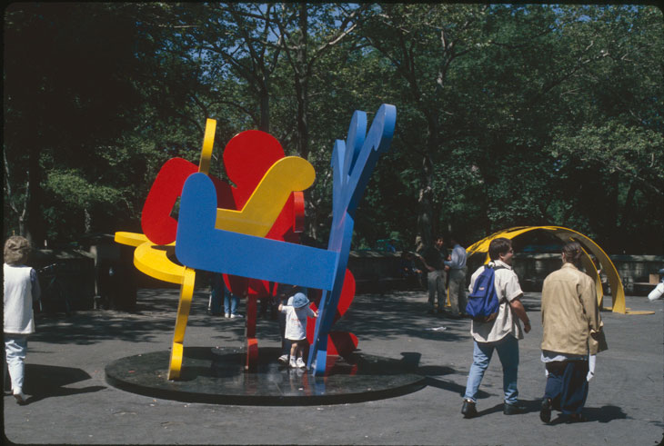 Keith Haring's Yellow Arching Figure and Untitled (Three Dancing Figures), installed at Doris C. Freedman Plaza, New York in 1997.