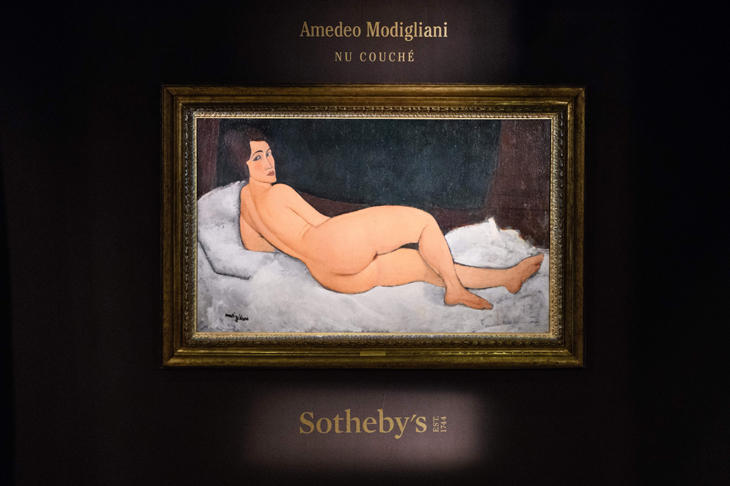 Amedeo Modigliani's Nu couché (sur le côté gauche) at Sotheby's Hong Kong in April 2018.