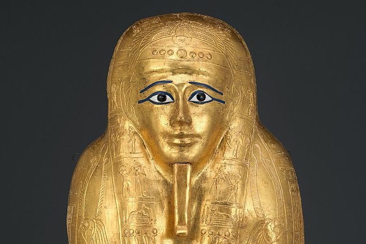 The gilded ancient Egyptian coffin at the Met in New York (detail).