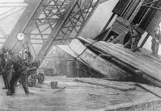 Workmen riveting the bases of the Eiffel Tower in place using hydraulic power in c. 1888.