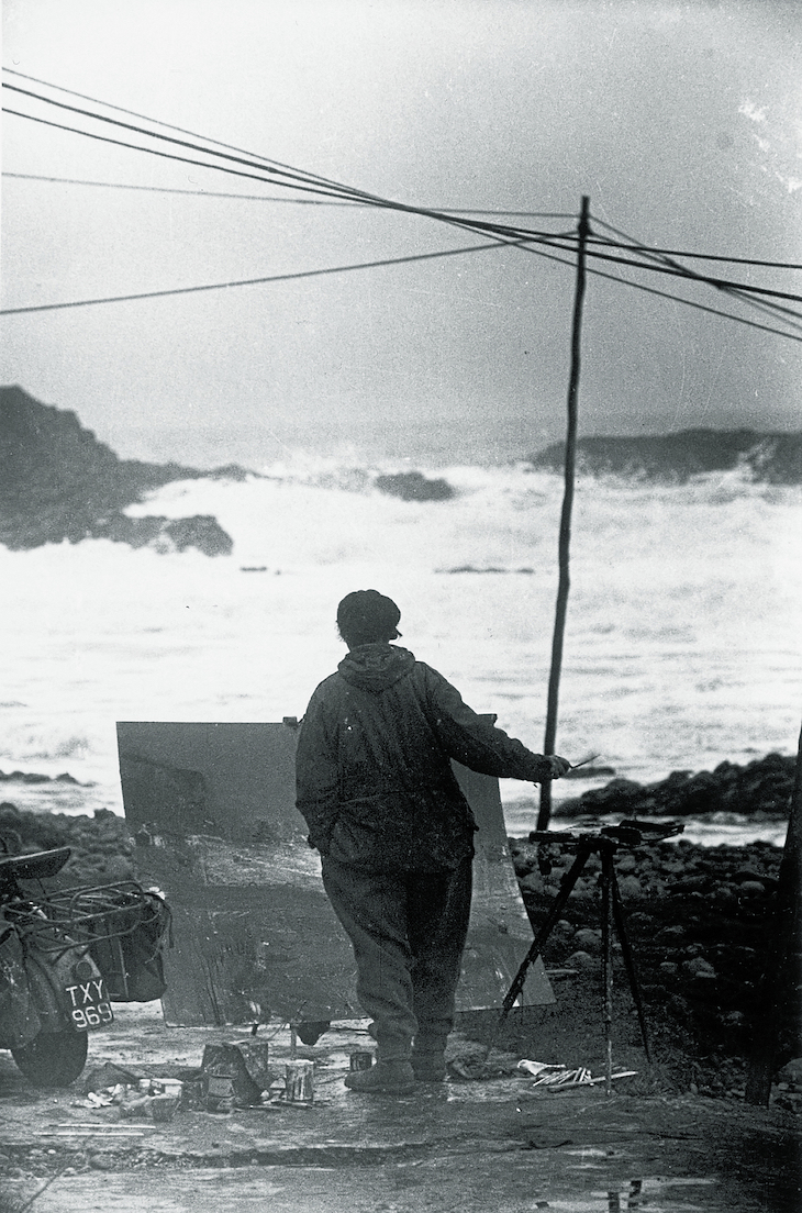 Joan Eardley, photographed on the coast at Catterline in 1960 by Audrey Walker.