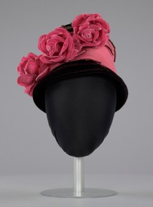Black and pink beehive hat with pink flowers, (1941–1994), Mae’s Milinery Shop. The Smithsonian National Museum of African American History and Culture