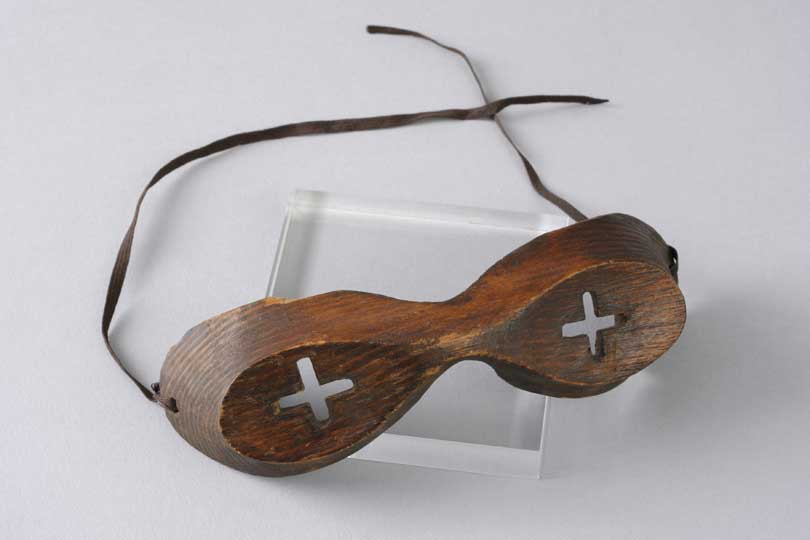 Wooden Inuit snow goggles. Used during the Discovery expedition, 1901–04 © The Polar Museum. Photo: Paul Tucker