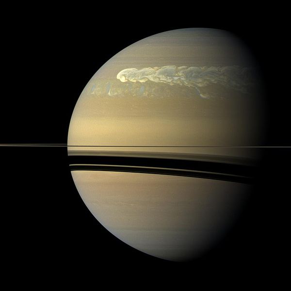A storm girdles the planet Saturn in 2011