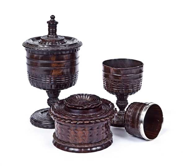 A rare collection of Lignum Vitae ornamentally turned objects by 'The Tudor Court Turner and his inheritor', England (late 16th and early 17th century).