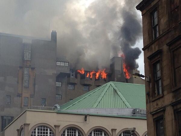 Photos show flames and smoke billowing from the windows