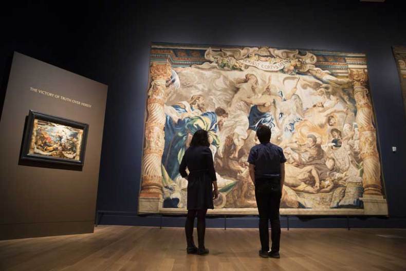 Installation view of 'Spectacular Rubens: The Triumph of the Eucharist', with 'The Victory of Truth over Heresy', (c. 1622–25), Peter Paul Rubens (Museo Nacional del Prado, Madrid), and 'The Triumph of Truth over Heresy' (1626–33), woven by Jan Raes I, Jacob Geubels II, and Jacob Fobert after designs by Peter Paul Rubens (Tapestry © Patrimonio Nacional, Monasterio de las Descalzas Reales, Madrid)