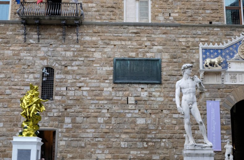 Koons's 'Pluto and Proserpina' joins Michelangelo's 'David' outside the Palazzo Vecchio in Florence.