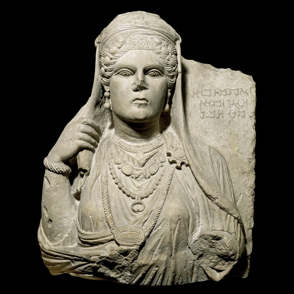 Stone funerary bust of Aqmat (late 2nd century AD), Palmyra, Syria.