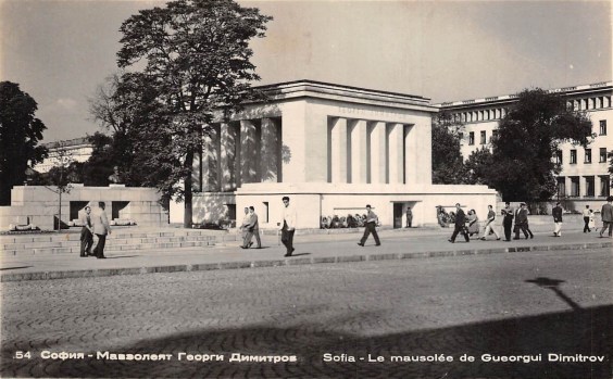 A postcard stamp marked 1957, showing the Georgi Dimitrov mausoleum in Sofia. The building was designed by Georgi Ovcharov in 1949 and demolished in 1999