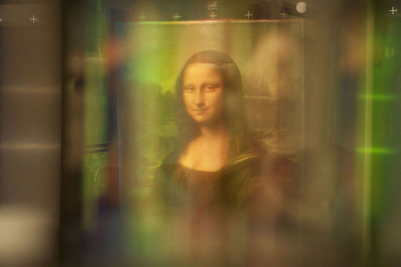 The Mona Lisa, as viewed through Pascal Cotte's multispectral imaging camera which takes photos at 13 different light wavelengths, and uses complex algorithms to analyse and uncover hidden details in paintings at layers and depths never possible before.