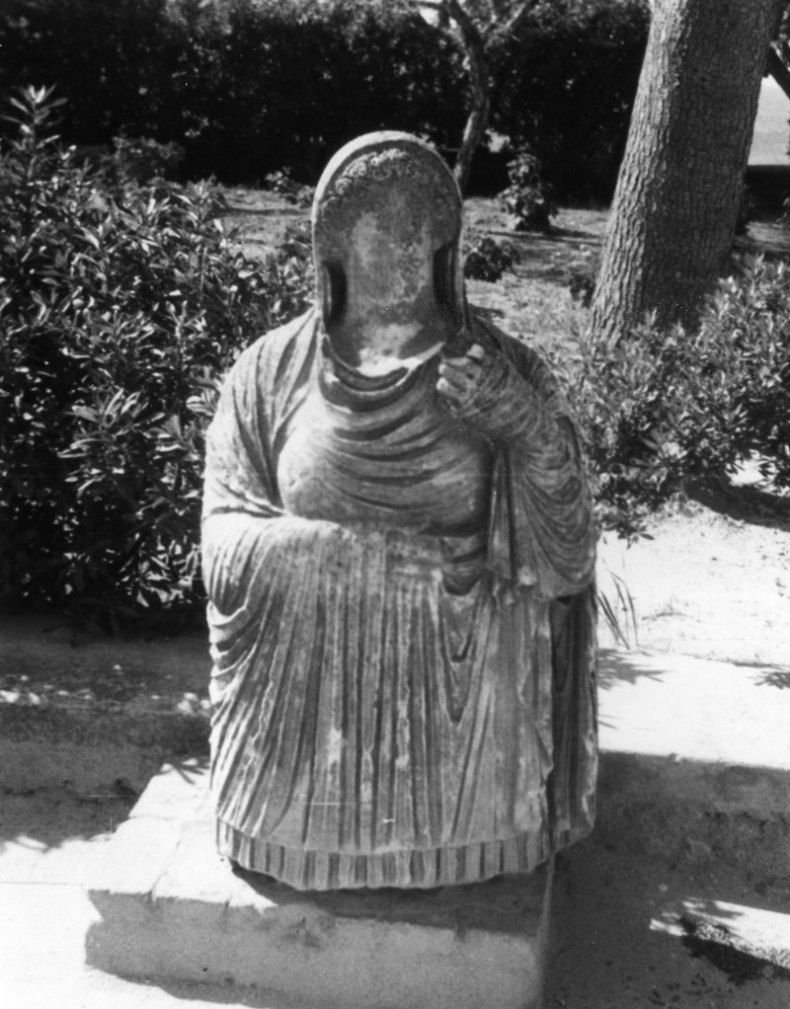 Faceless statue of Persephone rising from the underworld. This figure once adorned a tomb at Cyrene (c. 350-150 BC)