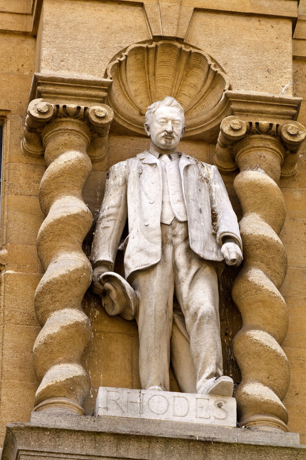 Statue of Cecil Rhodes on the façade of Oriel College, Oxford on the High Street, built in 1911