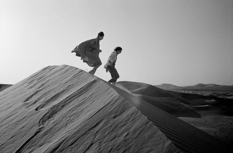 Christo and Jeanne-Claude looking for a possible site for The Mastaba, February 1982