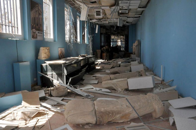 A view shows damaged artefacts inside the museum of the historic city of Palmyra, after forces loyal to Syria's President Bashar al-Assad recaptured the city, in Homs Governorate in this handout picture provided by SANA on March 27, 2016.