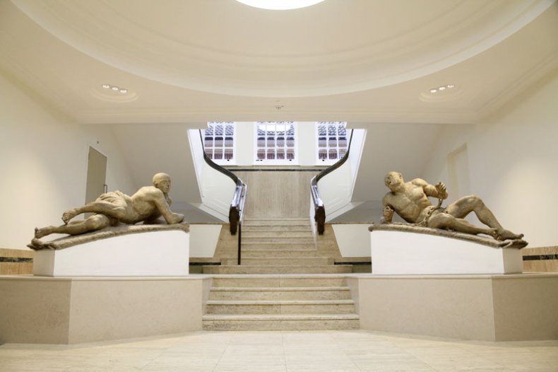 The Bethlem Museum of the Mind, with statues Raving and Melancholy Madness by Caius Gabriel Cibber.