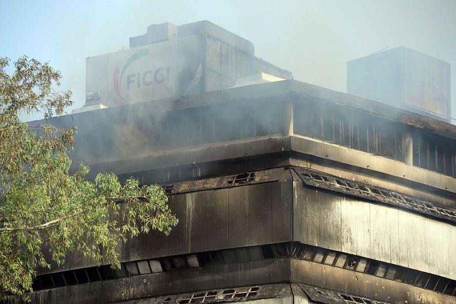 Smoke rises from The National Museum of Natural History in New Delhi on April 26, 2016, after an early morning fire was controlled. No casualties were reported, but the entire collection may have been lost.