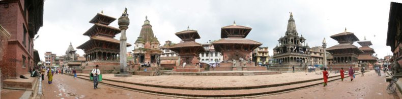 Pre-earthquake panoramic view of Patan Darbar (Royal) Square as seen from the Patan Palace. (The palace west facade is visible at the far ends of the photo).