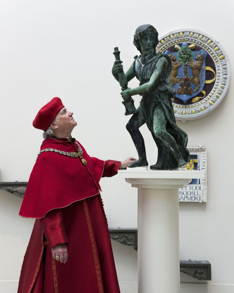 Actor Paul Jesson as Cardinal Wolsey, with one of Wolsey's angels at the V&A