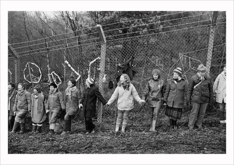 ‘Embrace the Base’: 30,000 women link hands, completely surrounding the nine mile perimeter fence at RAF/USAF Greenham Common, Berkshire