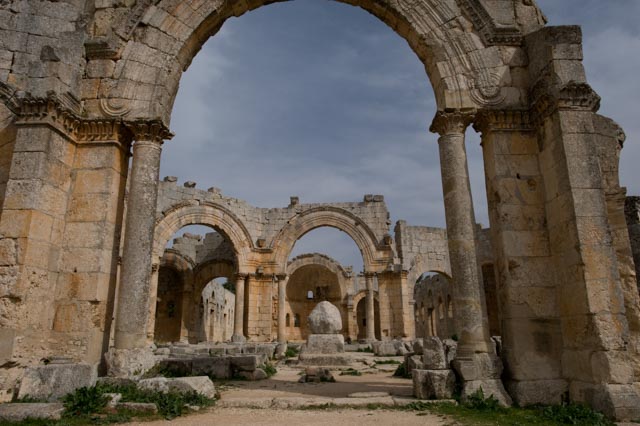 The courtyard of the Church of St Simeon looking east through the courtyard towards the east basilica. The remaining stub of the saint’s column in the middle of the courtyard has been dislodged by the blast.