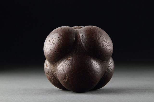 Stone sphere or ball divided into six sections (3000–2500 BC), early Scottish or Pictish.
