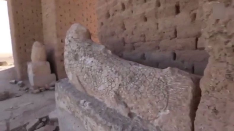 Screenshot from the ISIS video showing The Fish Gate at the Temple of Nabu and the statues of the Seven Sages