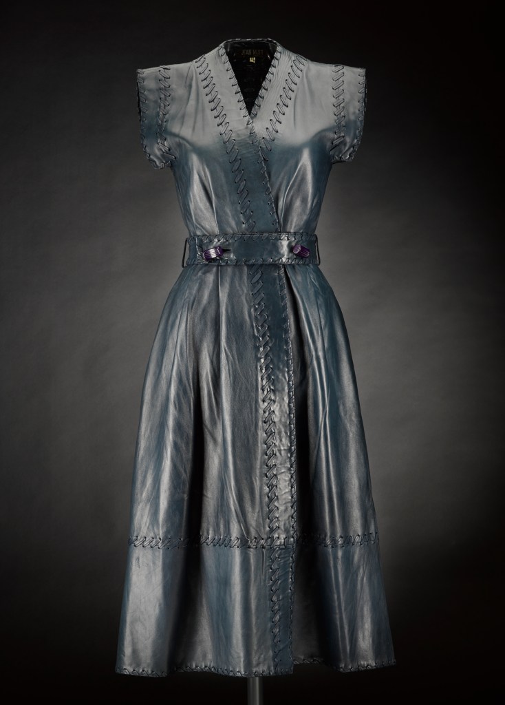 Blue leather coat dress, designed by Jean Muir. 