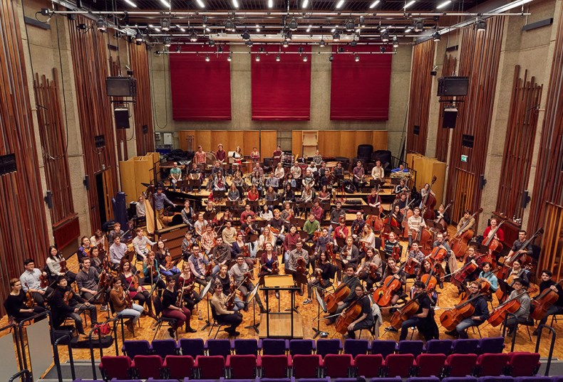Guildhall Symphony Orchestra demonstrated the potential impact of Brexit by releasing two photographs: the first with their EU students, the second without.