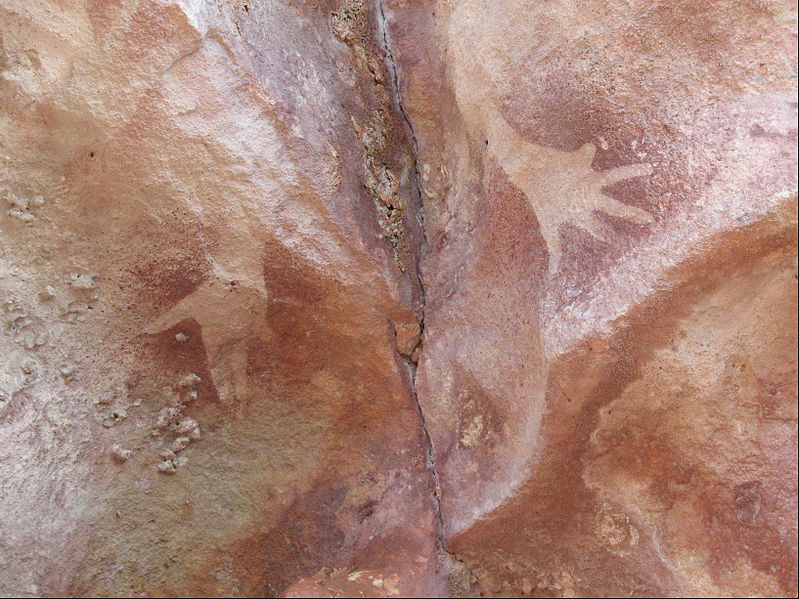 Hand stencils with mutilated little finger at the Djulirri rock art site in the Wellington Range of Arnhem Land, Northern Territory, Australia.