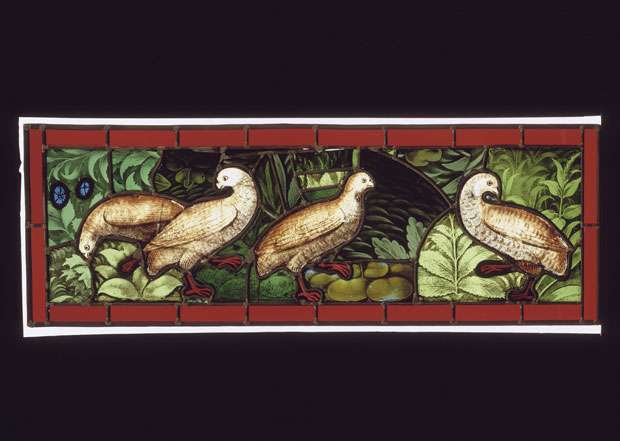 Stained glass window with partridges