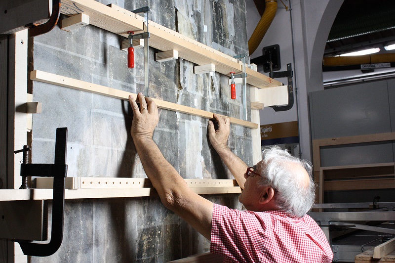 Giorgio Vasari's 'The Last Supper' under restoration. Ciro Castelli checking the surface of one of the panels during repair of the board joins. Photo: Britta New