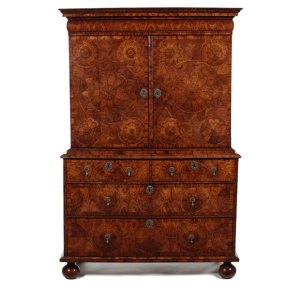 A William & Mary kingwood oyster veneered cabinet on chest attributed to Thomas Pistor £20,000-30,000. The Pedestal