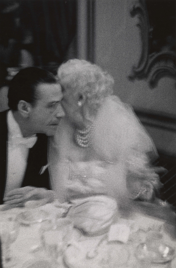 Elderly woman whispering to her dinner partner, Grand Opera Ball, N.Y.C. 1959, Diane Arbus. Courtesy The Metropolitan Museum of Art, New York / copyright © The Estate of Diane Arbus, LLC