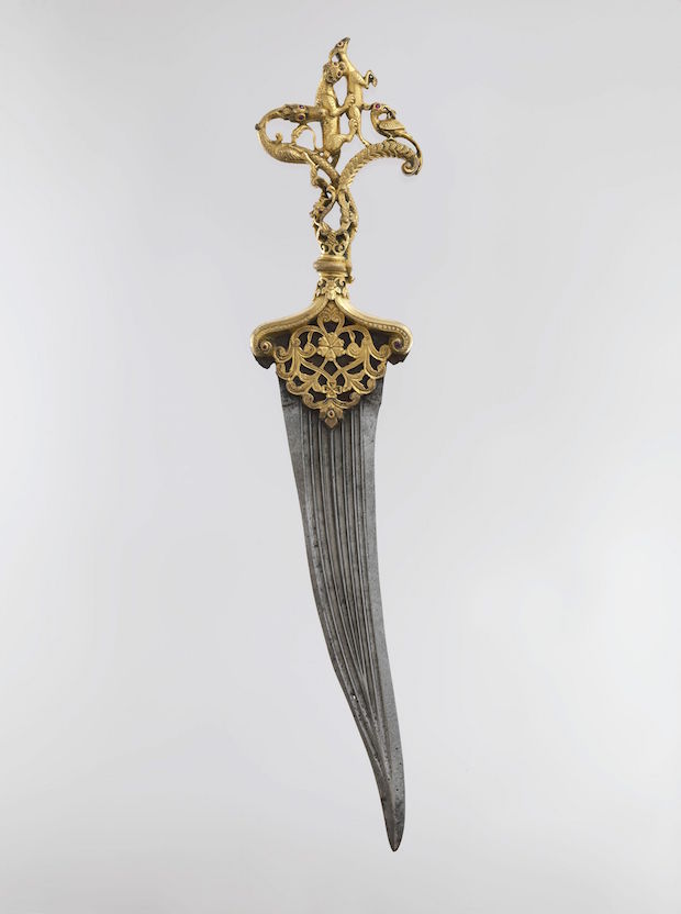 Dagger with zoomorphic hilt, second half of the 16th century, India, Deccan, Bijapur or Golconda, gilded copper hilt inlaid with rubies, steel blade, length 39.6cm. Sotheby’s London (£802,850) Credit: The Metropolitan Museum of Art