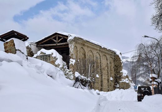 Italian military vehicles stand guard in front a Sant'Agostino church in Amatrice on January 19, 2017 after a 5.7-magnitude earthquake struck the region. The church was severely damaged in a major quake in August 2016. ANDREAS SOLARO/AFP/Getty Images