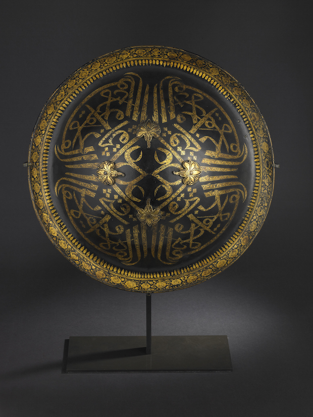 Lacquered hide shield (dhal), second half of the 18th century, India, probably Mysore, buffalo hide, gold and velvet, diam. 45cm. Peter Finer (£200,000)