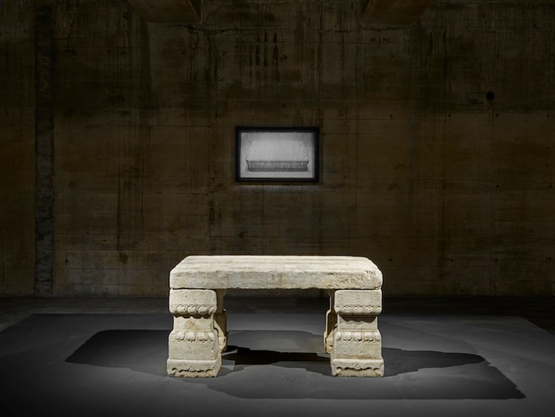 A 2010 daguerreotype by Adam Fuss hangs above a Chinese imperial stone table from the early Qing dynasty (17th century), installation view, Feuerle Collection, Berlin. Photo: def image; © The Feuerle Collection