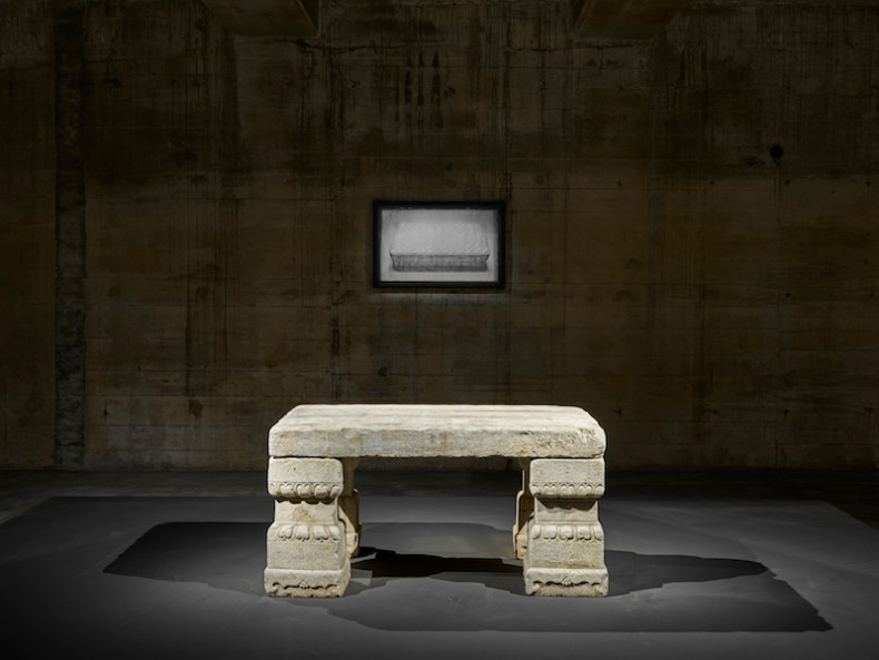 A 2010 daguerreotype by Adam Fuss hangs above a Chinese imperial stone table from the early Qing dynasty (17th century), installation view, Feuerle Collection, Berlin. Photo: def image; © The Feuerle Collection