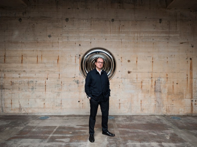 Désiré Feuerle photographed at his museum in Berlin beside Anish Kapoor's Torus (2002). Photo: def image; © The Feuerle Collection