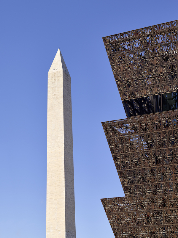 The Washington Monument and the facade of the National Museum of African American History and Culture, Washington, D.C. Photo: Alan Karchmer/NMAAHC