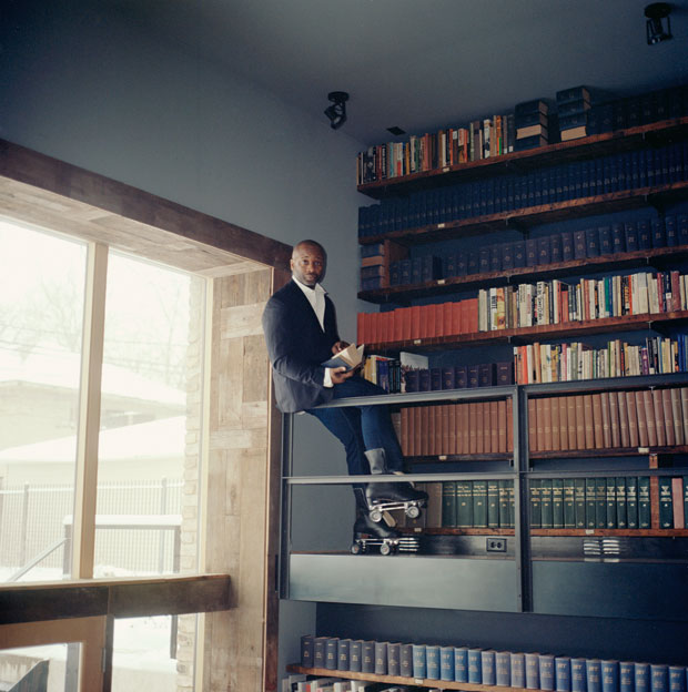Theaster Gates in the Stony Island Arts Bank, Chicago, which houses the Johnson Publishing Company archive. Photo: Mark Peckmezian