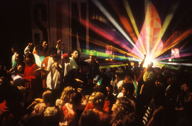 Ravers on the dancefloor at The Trip at Astoria, London (1988), David Swindells. Image courtesy Youth Club Archive