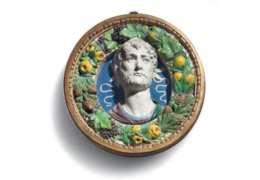 A polychrome glazed terracotta bust of a laureate in a frame of fruit, vegetables and pine cones (c. 1487–94), Andrea della Robbia