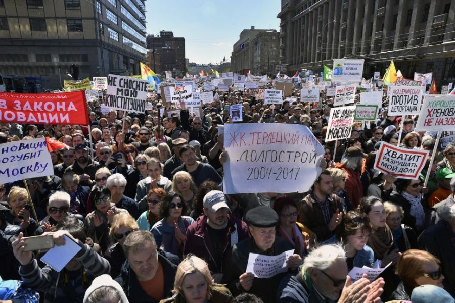 Demonstrators march during a protest in Moscow on 14 May, 2017, against the city's controversial plan to knock down Soviet-era apartment blocks and redevelop the old neighbourhoods. ALEXANDER NEMENOV/AFP/Getty Images