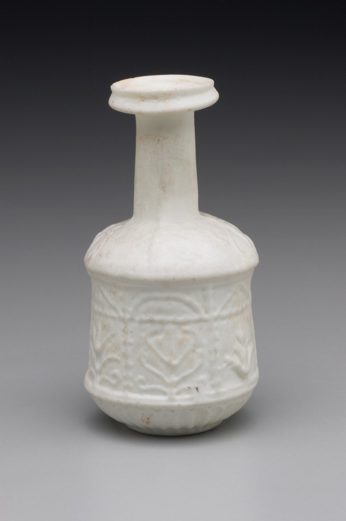 Roman, Eastern Mediterranean, possibly Syrian, ca. 1st century A.D., mold-blown glass bottle with plant motifs.
