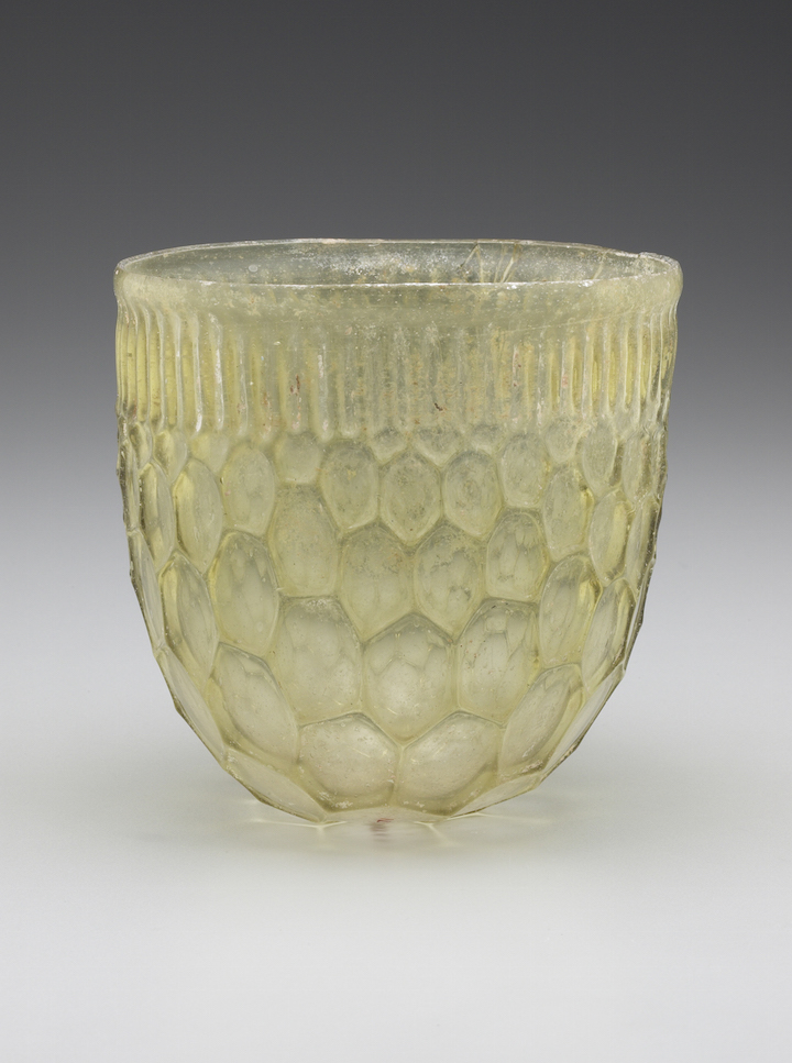 Roman honeycomb beaker, Eastern Mediterranean or Western Empire, 4th century A.D., cast and free-blown glass.