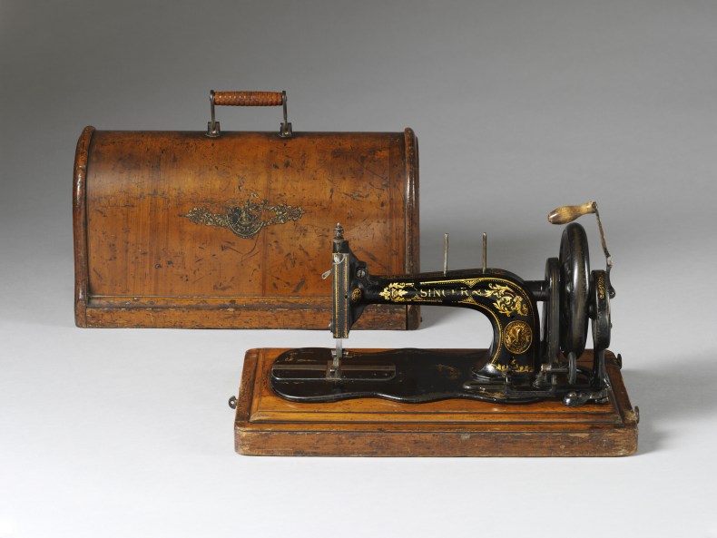 Singer sewing machine with plywood box (1888). Victoria and Albert Museum