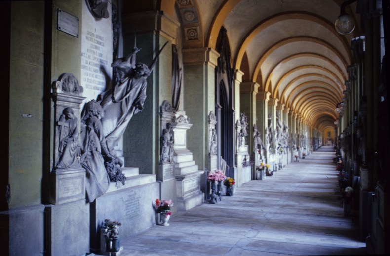 A colonnade at the monumental cemetery of Staglieno, Genoa.