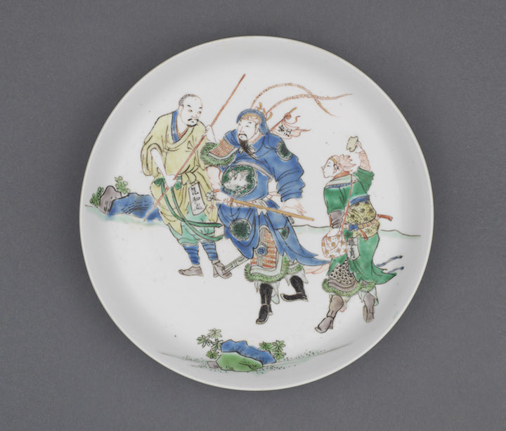 Saucer depicting three figures from the stories of the Water Margin, c. 1690, China, Kangxi period, diam. 17.5cm. Marchant (£78,000)